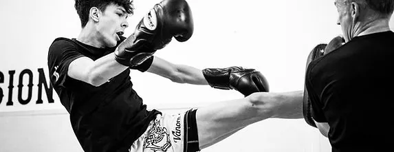 Muay Thai kick thrown during an active striking class at Mission BJJ in Mission, BC